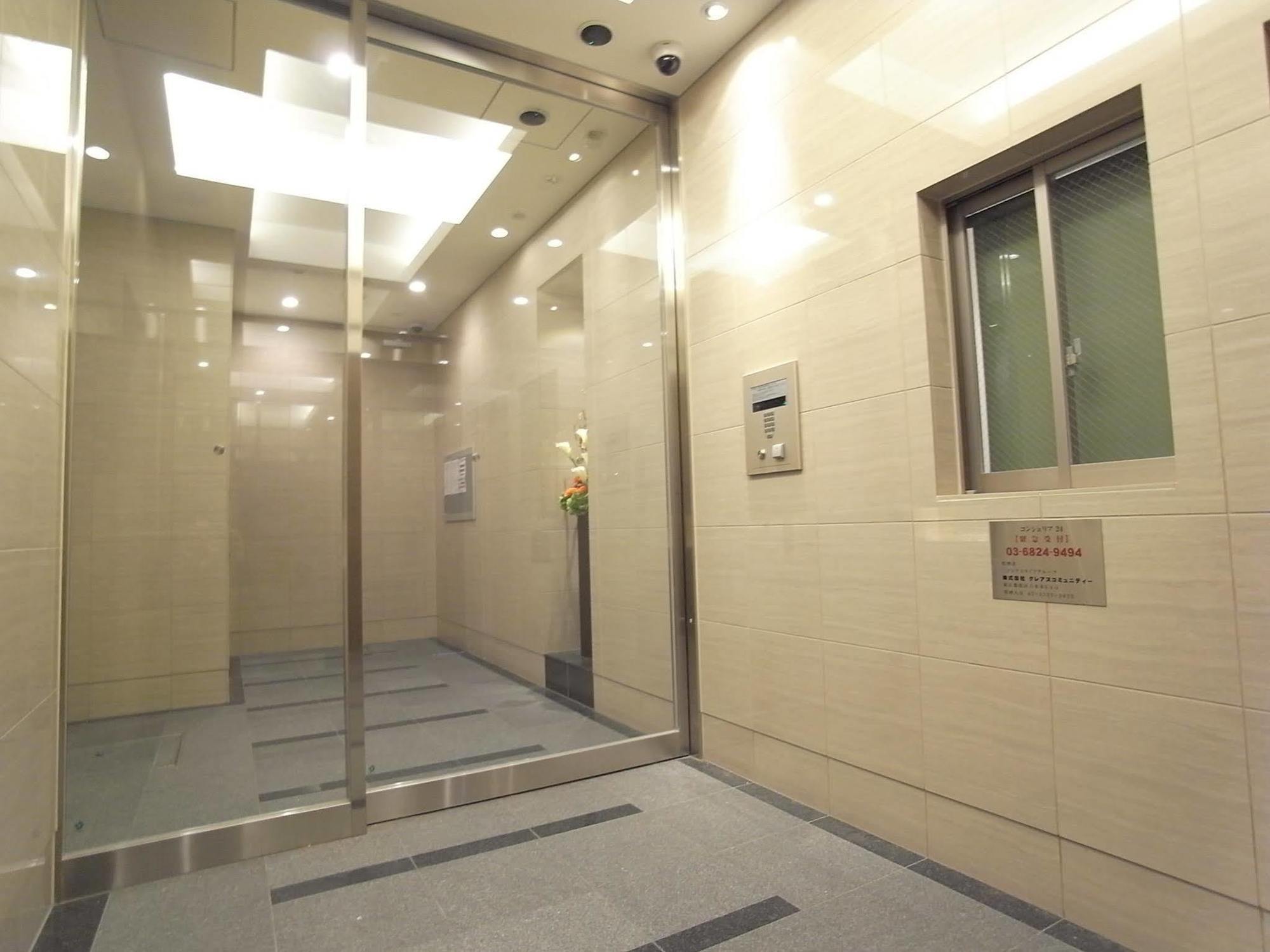 Апартаменты Concieria Shimbashi Crossia Токио Экстерьер фото